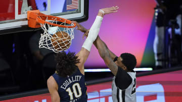 Rudy Gay #22 of the San Antonio Spurs dunks the ball as he gets past Jaxson Hayes #10 of the New Orleans Pelicans (Photo by Ashley Landis - Pool/Getty Images)