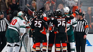 ANAHEIM, CA - APRIL 4: Ondrej Kase #25 and Brandon Montour #26 of the Anaheim Ducks celebrate a second period goal against Devan Dubnyk #40 of the Minnesota Wild during the game on April 4, 2018 at Honda Center in Anaheim, California. (Photo by Debora Robinson/NHLI via Getty Images)