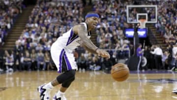 Jan 4, 2014; Sacramento, CA, USA; Sacramento Kings guard Isaiah Thomas (22) dribbles the ball against the Charlotte Bobcats in the fourth quarter at Sleep Train Arena. The Bobcats defeated the Kings 113-103. Mandatory Credit: Cary Edmondson-USA TODAY Sports