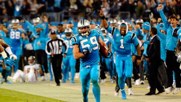 Carolina Panthers middle linebacker Luke Kuechly (59) returns the ball after a blocked New Orleans Saints field goal attempt in the second quarter at Bank of America Stadium in Charlotte, N.C., on Thursday, Nov. 17, 2016. (David T. Foster III/Charlotte Observer/TNS via Getty Images)