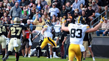 Oct 15, 2016; West Lafayette, IN, USA; Iowa Hawkeyes quarterback C.J. Beathard (16) scores a touchdown against the Purdue Boilermakers at Ross Ade Stadium. Mandatory Credit: Brian Spurlock-USA TODAY Sports