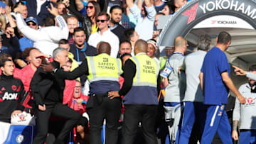 LONDON, ENGLAND - OCTOBER 20: Stewards hold back Jose Mourinho, Manager of Manchester United as he clashes with the Chelsea backroom staff during the Premier League match between Chelsea FC and Manchester United at Stamford Bridge on October 20, 2018 in London, United Kingdom. (Photo by Catherine Ivill/Getty Images)