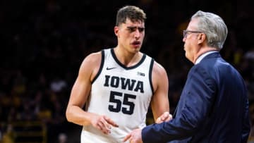 Iowa center Luka Garza (55) talks with Iowa head coach Fran McCaffery during a NCAA Big Ten Conference men's basketball game against Purdue, Tuesday, March 3, 2020, at Carver-Hawkeye Arena in Iowa City, Iowa.200303 Purdue Iowa Mbb 037 Jpg