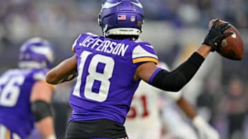 Jan 15, 2023; Minneapolis, Minnesota, USA; Minnesota Vikings wide receiver Justin Jefferson (18) passes the ball to quarterback Kirk Cousins (not pictured) during the first quarter of a wild card game at U.S. Bank Stadium. Mandatory Credit: Jeffrey Becker-USA TODAY Sports