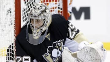 Dec 12, 2014; Pittsburgh, PA, USA; Pittsburgh Penguins goalie Marc-Andre Fleury (29) guards the net against the Calgary Flames during the third period at the CONSOL Energy Center. The Penguins won 3-1. Mandatory Credit: Charles LeClaire-USA TODAY Sports