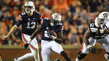 Sep 17, 2016; Auburn, AL, USA; Auburn Tigers running back Kerryon Johnson (21) runs the ball during the second quarter against the Texas A&M Aggies at Jordan Hare Stadium. Mandatory Credit: Shanna Lockwood-USA TODAY Sports