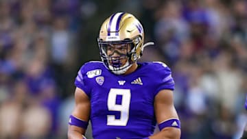 SEATTLE, WASHINGTON - SEPTEMBER 07: Joe Tryon #9 of the Washington Huskies walks to the huddle during the game against the California Golden Bears at Husky Stadium on September 07, 2019 in Seattle, Washington. (Photo by Alika Jenner/Getty Images)