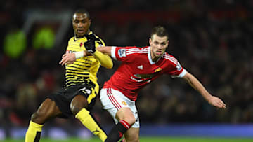 MANCHESTER, ENGLAND - MARCH 02: Odion Ighalo of Watford challenges Morgan Schneiderlin of Manchester United during the Barclays Premier League match between Manchester United and Watford at Old Trafford on March 2, 2016 in Manchester, England. (Photo by Laurence Griffiths/Getty Images)
