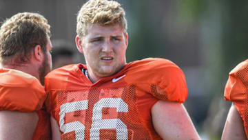 Clemson offensive lineman Will Putnam (56) is doing "thousands and thousands" of snaps as he moves to center this spring.Clemson Football Practice August 12