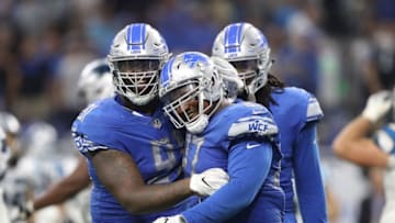 DETROIT, MI - OCTOBER 08: Armonty Bryant #97 and A'Shawn Robinson #91 of the Detroit Lions celebrate a fourth down stop against the Carolina Panthers at Ford Field on October 8, 2017 in Detroit, Michigan. Carolina defeated Detroit 27-24. (Photo by Leon Halip/Getty Images) (Photo by Leon Halip/Getty Images)