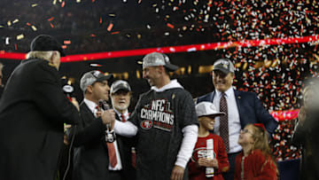SANTA CLARA, CA - JANUARY 19: Head Coach Kyle Shanahan of the San Francisco 49ers hands the NFC championship trophy to CEO Jed York during the NFC Championship trophy ceremony following game against the Green Bay Packers at Levi's Stadium on January 19, 2020 in Santa Clara, California. The 49ers defeated the Packers 37-20. (Photo by Michael Zagaris/San Francisco 49ers/Getty Images)