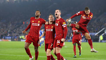LEICESTER, ENGLAND - DECEMBER 26: James Milner of Liverpool celebrates after scoring his sides second goal with Jordan Henderson and Georginio Wijnaldum during the Premier League match between Leicester City and Liverpool FC at The King Power Stadium on December 26, 2019 in Leicester, United Kingdom. (Photo by Alex Pantling/Getty Images)