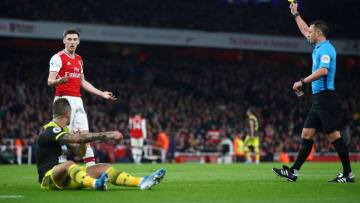 LONDON, ENGLAND - NOVEMBER 23: Kieran Tierney of Arsenal reacts after a receiving a yellow card and conceding a penalty for a foul on Danny Ings of Southampton during the Premier League match between Arsenal FC and Southampton FC at Emirates Stadium on November 23, 2019 in London, United Kingdom. (Photo by Julian Finney/Getty Images)