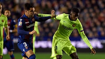 VALENCIA, SPAIN - DECEMBER 16: Tono Garcia of Levante competes for the ball with Ousmane Dembele of Barcelona during the La Liga match between Levante UD and FC Barcelona at Ciutat de Valencia on December 16, 2018 in Valencia, Spain. (Photo by Quality Sport Images/Getty Images)