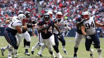 Dec 1, 2013; Houston, TX, USA; Houston Texans running back Ben Tate (44) runs with the ball for a fourth quarter touchdown against the New England Patriots at Reliant Stadium. The Patriots beat the Texans 34-31. Mandatory Credit: Matthew Emmons-USA TODAY Sports