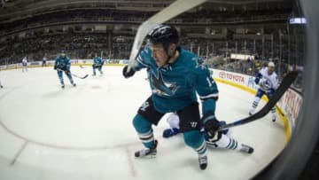 September 29, 2015; San Jose, CA, USA; San Jose Sharks left wing Raffi Torres (13) chases for the puck against the Vancouver Canucks during the first period at SAP Center at San Jose. Mandatory Credit: Kyle Terada-USA TODAY Sports