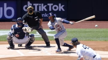 NEW YORK, NEW YORK - MAY 06: Jose Altuve #27 of the Houston Astros singles during the first inning against Gerrit Cole #45 of the New York Yankees at Yankee Stadium on May 06, 2021 in New York City. (Photo by Jim McIsaac/Getty Images)