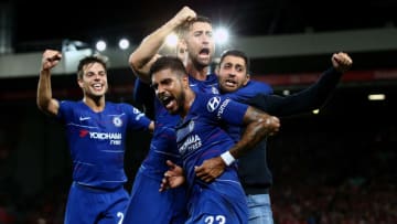 LIVERPOOL, ENGLAND - SEPTEMBER 26: Emerson of Chelsea celebrates with his teammates and a fan after he scores his sides first goal during the Carabao Cup Third Round match between Liverpool and Chelsea at Anfield on September 26, 2018 in Liverpool, England. (Photo by Jan Kruger/Getty Images)