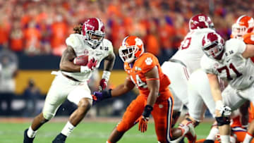 Jan 11, 2016; Glendale, AZ, USA; Alabama Crimson Tide running back Derrick Henry (2) runs away from the Clemson Tigers defense to score a touchdown in the first quarter in the 2016 CFP National Championship at University of Phoenix Stadium. Mandatory Credit: Mark J. Rebilas-USA TODAY Sports