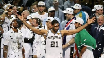 Jun 15, 2014; San Antonio, TX, USA; San Antonio Spurs forward Tim Duncan (21) celebrates after a victory against the Miami Heat in game five of the 2014 NBA Finals at AT&T Center. The Spurs defeated Miami 104-87 to win the NBA Finals. Mandatory Credit: Soobum Im-USA TODAY Sports