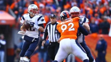 Jan 24, 2016; Denver, CO, USA; New England Patriots quarterback Tom Brady (12) against the Denver Broncos in the AFC Championship football game at Sports Authority Field at Mile High. Mandatory Credit: Mark J. Rebilas-USA TODAY Sports