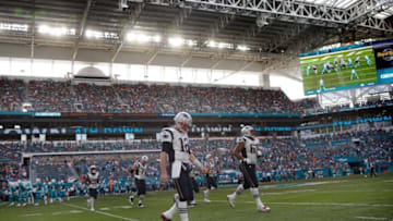 Jan 1, 2017; Miami Gardens, FL, USA; New England Patriots quarterback Tom Brady (12) walks off of the field during the second half of an NFL football game against the Miami Dolphins at Hard Rock Stadium. The Patriots won 35-14. Mandatory Credit: Reinhold Matay-USA TODAY Sports