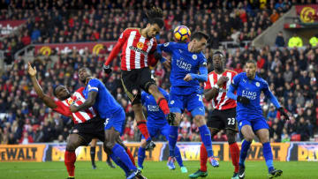 SUNDERLAND, ENGLAND - DECEMBER 03: Jason Denayer of Sunderland and Christian Fuchs of Leicester City compete for the ball during the Premier League match between Sunderland and Leicester City at Stadium of Light on December 3, 2016 in Sunderland, England. (Photo by Stu Forster/Getty Images)