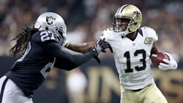 Sep 11, 2016; New Orleans, LA, USA; Oakland Raiders defensive back Reggie Nelson (27) pushes New Orleans Saints wide receiver Michael Thomas (13) out of bounds after a catch in the second quarter at the Mercedes-Benz Superdome. Mandatory Credit: Chuck Cook-USA TODAY Sports