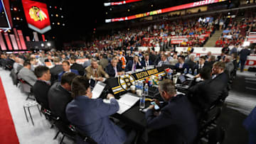 CHICAGO, IL - JUNE 23: A general view of the Boston Bruins draft table is seen during Round One of the 2017 NHL Draft at United Center on June 23, 2017 in Chicago, Illinois. (Photo by Dave Sandford/NHLI via Getty Images)
