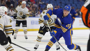 Sep 26, 2023; Buffalo, New York, USA; Buffalo Sabres center Jiri Kulich (20) takes a shot on goal during the second period against the Boston Bruins at KeyBank Center. Mandatory Credit: Timothy T. Ludwig-USA TODAY Sports