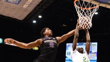 March 10, 2016; Las Vegas, NV, USA; Washington Huskies forward Marquese Chriss (0) and Oregon Ducks forward Chris Boucher (25) fight for the rebound during the first half of the Pac-12 Conference tournament at MGM Grand Garden Arena. Mandatory Credit: Kyle Terada-USA TODAY Sports