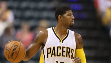 Oct 8, 2015; Indianapolis, IN, USA; Indiana Pacers forward Paul George (13) brings the ball up court against the Orlando Magic at Bankers Life Fieldhouse. Indiana defeats Orlando 97-92. Mandatory Credit: Brian Spurlock-USA TODAY Sports