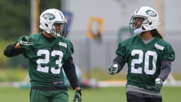 Jun 9, 2015; Florham Park, NJ, USA; New York Jets cornerback Dexter McDougle (23) and New York Jets cornerback Marcus Williams (20) talk during New York Jets minicamp at Atlantic Health Jets Training Center. Mandatory Credit: Ed Mulholland-USA TODAY Sports