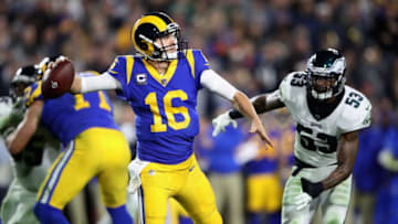 LOS ANGELES, CA - DECEMBER 16: Jared Goff #16 of the Los Angeles Rams passes the ball under pressure from Nigel Bradham #53 of the Philadelphia Eagles during the second half of a game at Los Angeles Memorial Coliseum on December 16, 2018 in Los Angeles, California. (Photo by Sean M. Haffey/Getty Images)