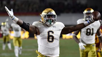 LOS ANGELES, CA - NOVEMBER 24: Tony Jones Jr. #6 of the Notre Dame Fighting Irish scores a touchdown against USC Trojans during the second half at Los Angeles Memorial Coliseum on November 24, 2018 in Los Angeles, California. (Photo by Kevork Djansezian/Getty Images)