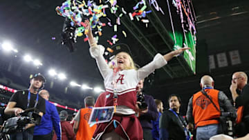 Dec 31, 2015; Arlington, TX, USA; Alabama Crimson Tide young fan celebrates with confetti after a victory against the Michigan State Spartans in the second half of the 2015 CFP semifinal at the Cotton Bowl at AT&T Stadium. Mandatory Credit: Matthew Emmons-USA TODAY Sports