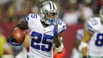 Nov 4, 2012; Atlanta, GA, USA; Dallas Cowboys running back Lance Dunbar (25) runs the ball in the second half against the Atlanta Falcons at the Georgia Dome. The Falcons won 19-13. Mandatory Credit: Daniel Shirey-USA TODAY Sports