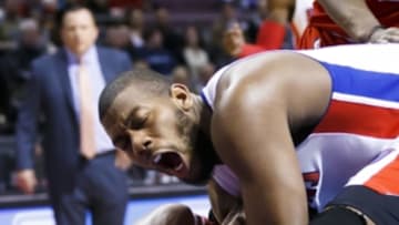 Mar 5, 2014; Auburn Hills, MI, USA; Chicago Bulls center Joakim Noah (left) and Detroit Pistons power forward Greg Monroe (right) tie up the ball for a jump ball in the third quarter at The Palace of Auburn Hills. Chicago won 105-94. Mandatory Credit: Rick Osentoski-USA TODAY Sports