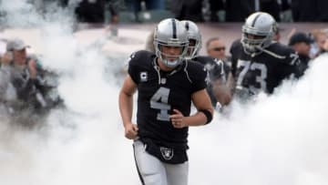 Dec 6, 2015; Oakland, CA, USA; Oakland Raiders quarterback Derek Carr (4) runs onto the field before an NFL football game against the Kansas City Chiefs at O.co Coliseum. The Chiefs defeated the Raiders 34-20. Mandatory Credit: Kirby Lee-USA TODAY Sports