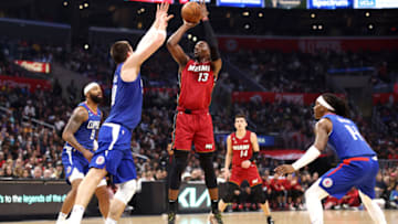 Bam Adebayo #13 of the Miami Heat shoots the ball against Ivica Zubac #40, Marcus Morris Sr. #8 and Terance Mann #14 of the Los Angeles Clippers(Photo by Katelyn Mulcahy/Getty Images)
