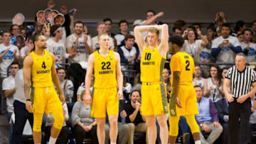 VILLANOVA, PA - FEBRUARY 27: Theo John #4, Joey Hauser #22, Sam Hauser #10, and Sacar Anim #2 of the Marquette Golden Eagles look on against the Villanova Wildcats in the second half at Finneran Pavilion on February 27, 2019 in Villanova, Pennsylvania. The Villanova Wildcats defeated the Marquette Golden Eagles 67-61. (Photo by Mitchell Leff/Getty Images)