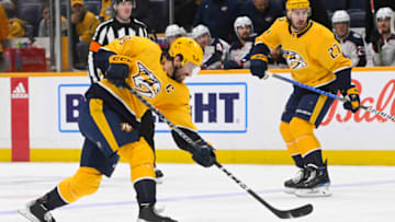 Jan 17, 2023; Nashville, Tennessee, USA; Nashville Predators defenseman Roman Josi (59) takes a shot on goal against the Columbus Blue Jackets during the first period at Bridgestone Arena. Mandatory Credit: Steve Roberts-USA TODAY Sports