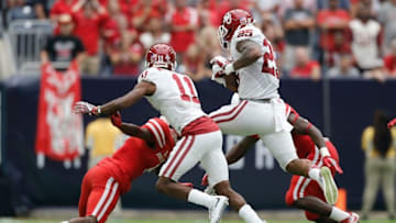 Sep 3, 2016; Houston, TX, USA; Oklahoma Sooners running back Joe Mixon (25) rushes against the Houston Cougars at NRG Stadium. Houston Cougars won 33 to 23. Mandatory Credit: Thomas B. Shea-USA TODAY Sports
