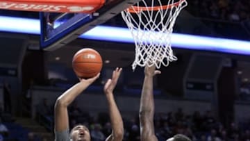 Feb 6, 2016; University Park, PA, USA; Penn State Nittany Lions forward Julian Moore (44) shoots the ball as Indiana Hoosiers center Thomas Bryant (31) defends at Bryce Jordan Center. Penn State defeated Indiana 68-63. Mandatory Credit: Matthew O