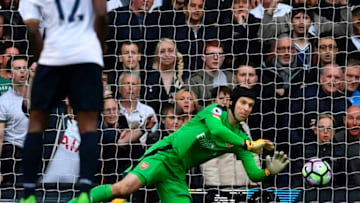 Arsenal's Czech goalkeeper Petr Cech makes a save during the English Premier League football match between Tottenham Hotspur and Arsenal at White Hart Lane in London, on April 30, 2017. / AFP PHOTO / Ben STANSALL / RESTRICTED TO EDITORIAL USE. No use with unauthorized audio, video, data, fixture lists, club/league logos or 'live' services. Online in-match use limited to 75 images, no video emulation. No use in betting, games or single club/league/player publications. / (Photo credit should read BEN STANSALL/AFP/Getty Images)