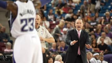 Oct 7, 2014; Sacramento, CA, USA; Sacramento Kings head coach Keith Smart instructs guard Ben McLemore (23) on an inbound play against the Toronto Raptors during the first quarter at Sleep Train Arena. Mandatory Credit: Ed Szczepanski-USA TODAY Sports