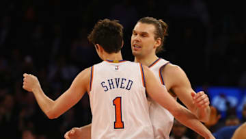 NEW YORK, NY - MARCH 17: Lou Amundson #21 of the New York Knicks celebrates his game tying basket with Alexey Shved #1 forcing the game into overtime against the San Antonio Spurs during their game at Madison Square Garden on March 17, 2015 in New York City. (Photo by Al Bello/Getty Images)