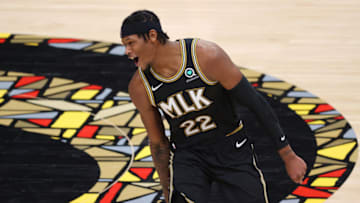 Cam Reddish #22 of the Atlanta Hawks celebrates a three point basket against the Milwaukee Bucks during the second half in Game Four of the Eastern Conference Finals at State Farm Arena on June 29, 2021 in Atlanta, Georgia. NOTE TO USER: User expressly acknowledges and agrees that, by downloading and or using this photograph, User is consenting to the terms and conditions of the Getty Images License Agreement. (Photo by Kevin C. Cox/Getty Images)
