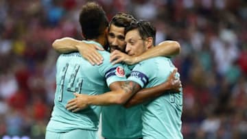 SINGAPORE - JULY 28: Mesut Ozil of Arsenal celebrates with Pierre-Emerick Aubameyang after scoring a goal during the International Champions Cup match between Arsenal and Paris Saint Germain at the National Stadium on July 28, 2018 in Singapore. (Photo by Suhaimi Abdullah/Getty Images for ICC)