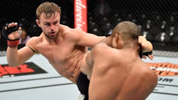 LAS VEGAS, NV - JULY 08: (L-R) Cody Stamann kicks with Terrion Ware in their featherweight bout during the UFC 213 event at T-Mobile Arena on July 8, 2017 in Las Vegas, Nevada. (Photo by Jeff Bottari/Zuffa LLC/Zuffa LLC via Getty Images)